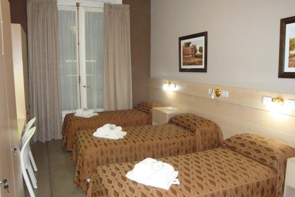 Cama individual en habitación compartida para mujeres
